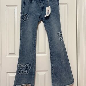 Women’s Blue Distressed Flare Jeans with Butterfly Appliqué